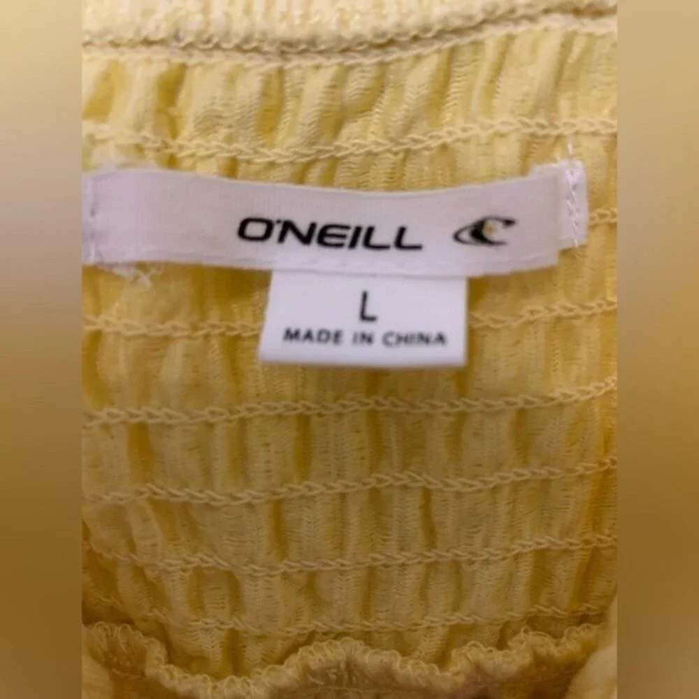 NWT ONEILL THEA KNIT ROMPER IN YELLOW . SIZE LARGE